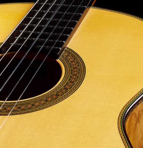 The soundboard and rosette of a 2024 Teodoro Perez "Especial" classical guitar made of spruce and maple