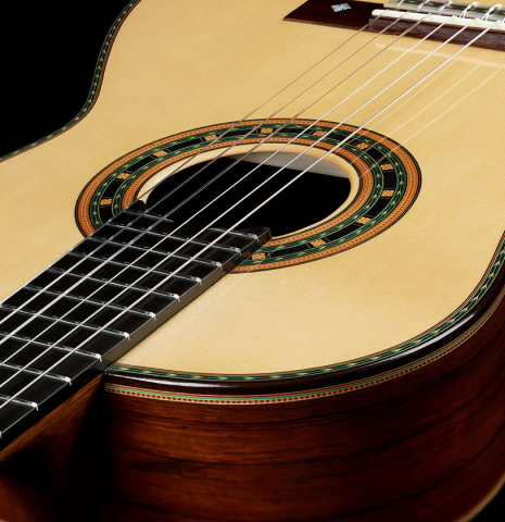 The soundboard and sides of a 2024 Teodoro Perez "1884 Torres - La Emperatriz" classical guitar made of spruce and African rosewood