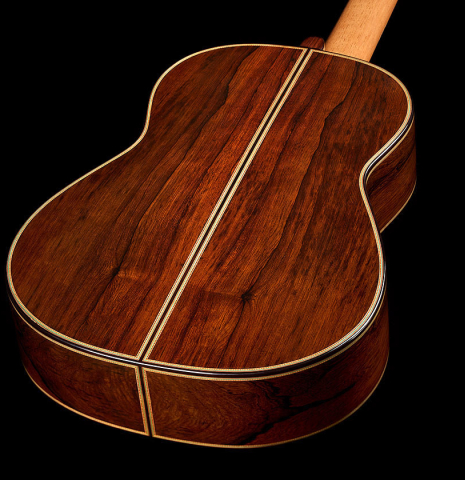 The back and sides of a 2025 Teodoro Perez "1884 Torres - La Emperatriz" classical guitar made of spruce and African rosewood