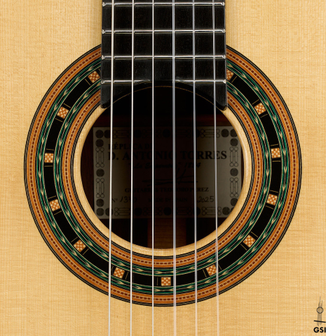 The rosette of a 2025 Teodoro Perez "1884 Torres - La Emperatriz" classical guitar made of spruce and African rosewood