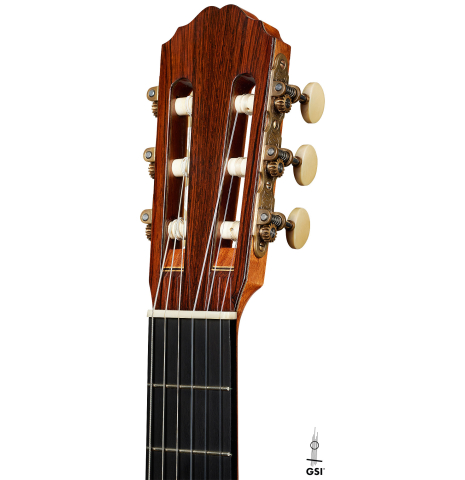 The headstock of a 2000 Daryl Perry classical guitar made of spruce and CSA rosewood