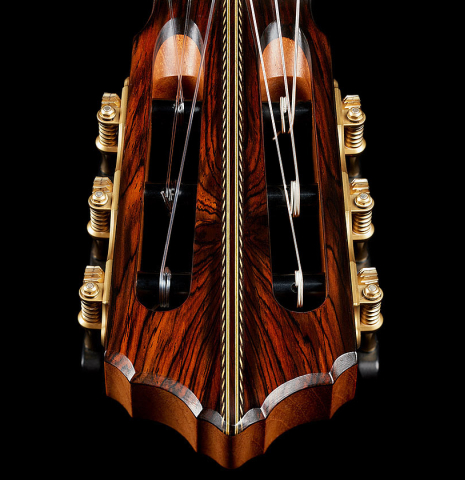 The headstock veneer and tuning machines of a 2025 Erez Perelman classical guitar made of cedar and CSA rosewood