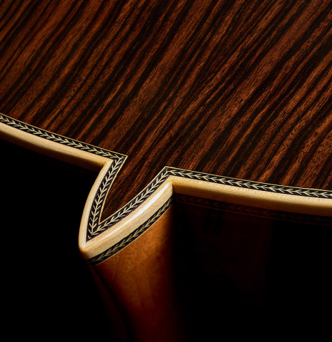The heel, back binding and purfling of a 2025 Teodoro Perez "Especial" classical guitar made of spruce and Makassar ebony