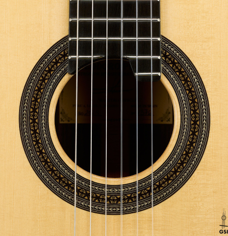 The rosette of a 2025 Teodoro Perez "Especial" classical guitar made of spruce and Makassar ebony