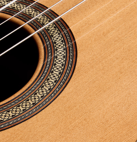 The soundboard and rosette of a 2026 Sergio Perez "Segovia" classical guitar made of cedar and Indian rosewood