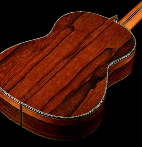 The back and sides of a 2026 Teodoro Perez "60th Anniversary" classical guitar made of cedar and African rosewood