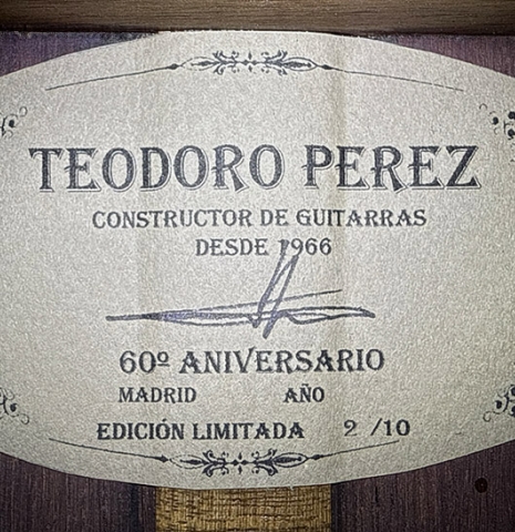 The label of a 2026 Teodoro Perez "60th Anniversary" classical guitar made of cedar and African rosewood