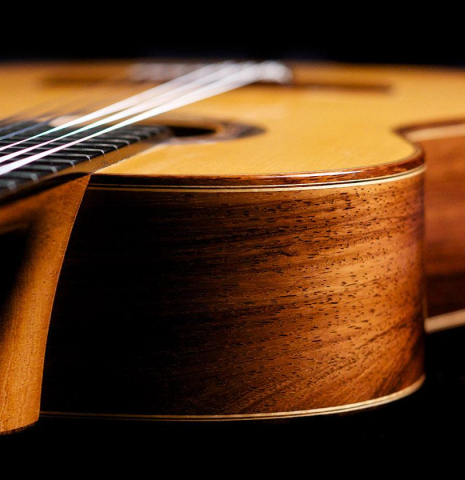 The side of a 2007 Jose Marin Plazuelo &quot;Bouchet&quot; classical guitar made with spruce and CSA rosewood
