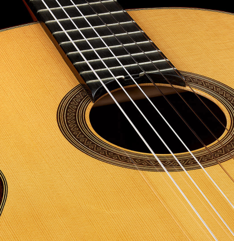 The top and rosette of a 2021 Jose Marin Plazuelo "Bouchet" classical guitar made with spruce and CSA rosewood