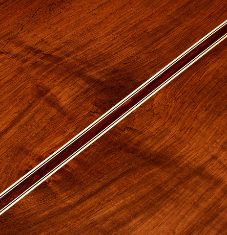 The back center seam of a 2024 Jose Marin Plazuelo "Bouchet" classical guitar made of spruce and CSA rosewood