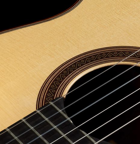 The soundboard and rosette detail of a 2024 Jose Marin Plazuelo "Bouchet" classical guitar made of spruce and CSA rosewood
