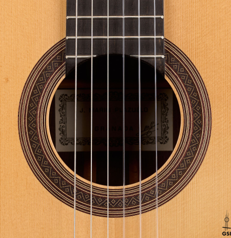 The rosette of a 2005 Jose Marin Plazuelo "Bouchet" classical guitar made of spruce and CSA rosewood