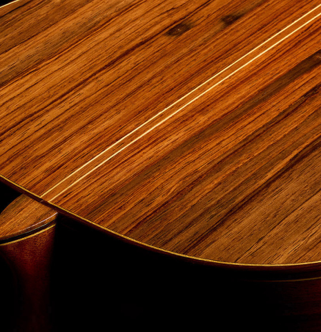The heel, back binding and purfling of a 1987 Richard Prenkert classical guitar made of spruce and CSA rosewood