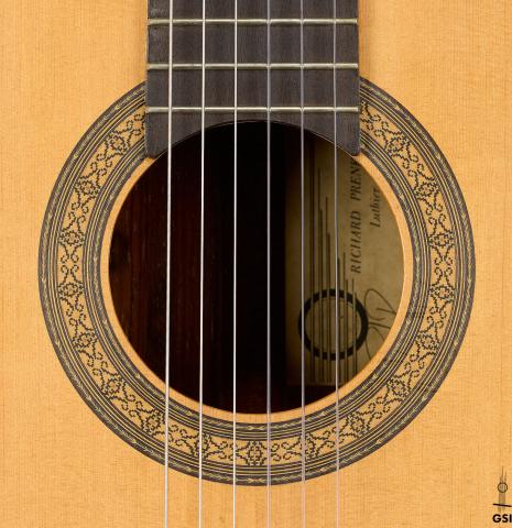 The rosette of a 1987 Richard Prenkert classical guitar made of spruce and CSA rosewood