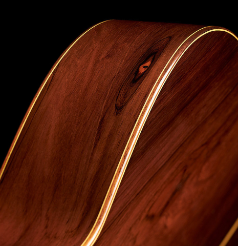 The back, sides and binding of a 2024 Jake Fuller "Purnell" classical guitar made of spruce and CSA rosewood