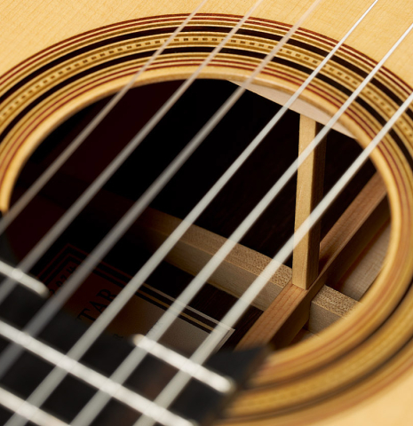 The rosette and soundpost of a 2024 Jake Fuller "Purnell" classical guitar made of spruce and CSA rosewood