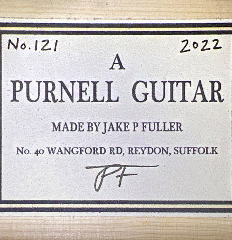The label of a 2022 Jake Fuller &quot;Purnell&quot; classical guitar made of spruce and Honduran rosewood