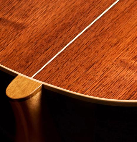 The back and heel of a 2022 Jake Fuller "Purnell" classical guitar made of spruce and Honduran rosewood
