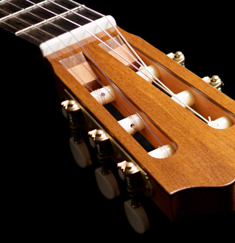 The headstock of a 2022 Jake Fuller &quot;Purnell&quot; classical guitar made of spruce and Honduran rosewood