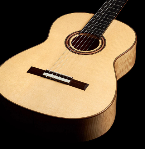 The front of a 2023 Jake Fuller "Purnell" classical guitar made with spruce and maple.