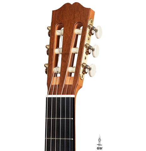 The headstock of a 2023 Jake Fuller "Purnell" classical guitar made with spruce and maple.