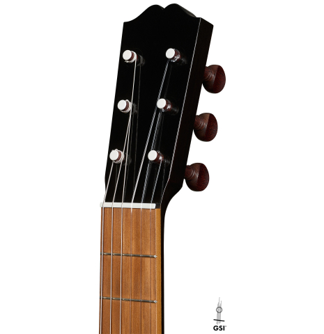 The headstock of a 2023 Jake Fuller "Purnell" w/pegs "Torres" classical guitar made of spruce and tulipwood