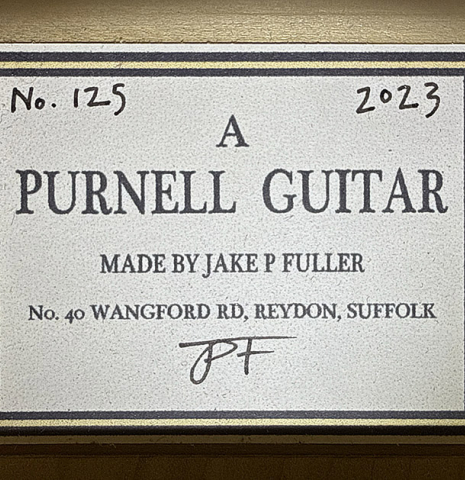 The label of a 2023 Jake Fuller "Purnell" w/pegs "Torres" classical guitar made of spruce and tulipwood
