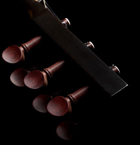 The peghead of a 2023 Jake Fuller "Purnell" w/pegs "Torres" classical guitar made of spruce and tulipwood