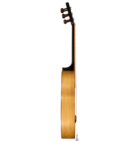 The side of a 2023 Jake Fuller "Purnell" w/pegs "Torres" classical guitar made of spruce and tulipwood