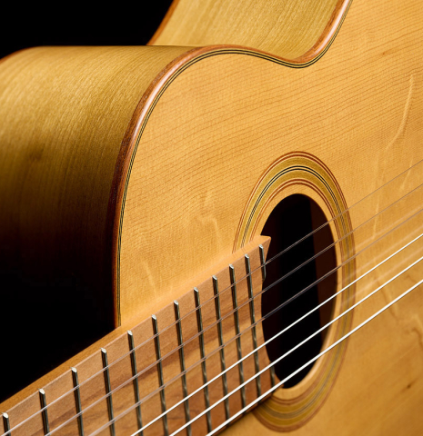 View from the fingerboard of a 2023 Jake Fuller "Purnell" w/pegs "Torres" classical guitar made of spruce and tulipwood