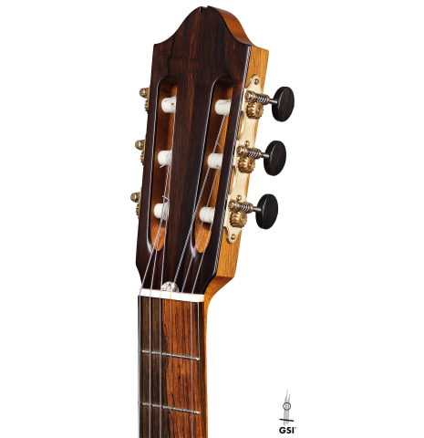 The headstock and tuners of a 2009 Fabio Ragghianti classical guitar made of spruce and CSA rosewood