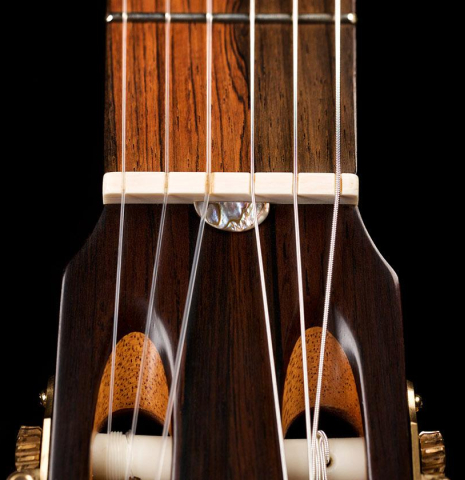 The headstock ornament of a 2009 Fabio Ragghianti classical guitar made of spruce and CSA rosewood