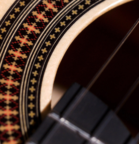 The rosette of a 2022 Raimundo Signature Edition “Tatyana Ryzhkova Black Limba” classical guitar made with spruce top