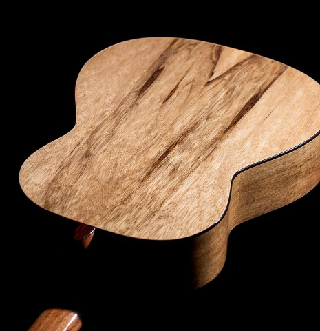 The back and sides of a 2022 Raimundo Signature Edition “Tatyana Ryzhkova Black Limba” classical guitar made with cedar top The back and sides of a 2022 Raimundo Signature Edition “Tatyana Ryzhkova Black Limba” classical guitar made with cedar top