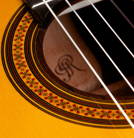 Detailed closeup of the rosette of a 2016 Jose Ramirez "1a C650-AP" classical guitar made of spruce and CSA rosewood