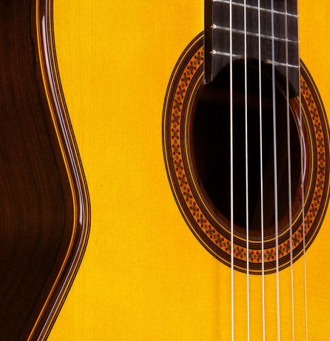 The soubdboard and rosette of a 2016 Jose Ramirez "1a C650-AP" classical guitar made of spruce and CSA rosewood