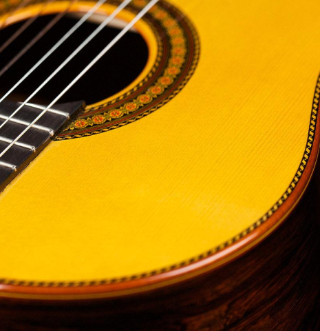 The top and rosette of a 2009 Jose Ramirez "Centenario" classical guitar made of spruce and CSA rosewood