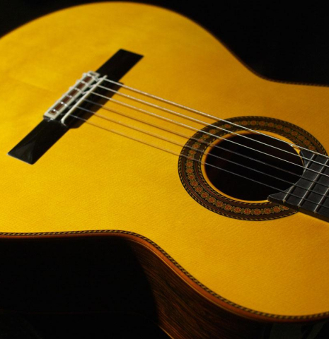 The soundboard of a 2009 Jose Ramirez "Centenario" classical guitar made of spruce and CSA rosewood