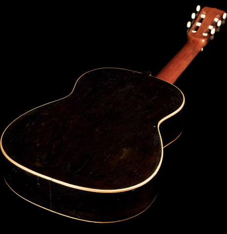 The back of a 1910 Jose Ramirez I classical guitar made of spruce and mahogany