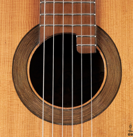 The rosette of a 1910 Jose Ramirez I classical guitar made of spruce and mahogany