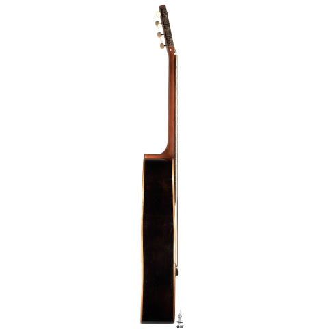 The side of a 1910 Jose Ramirez I classical guitar made of spruce and mahogany