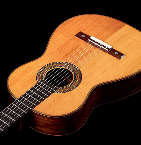 The front of a 1912 Manuel Ramirez classical guitar made of spruce and CSA rosewood