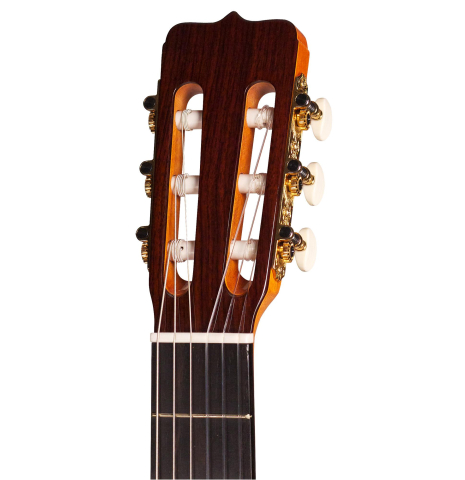 This is the headstock of a Jose Ramirez "130 Anos" classical guitar built in 2014 on a white background. It has a spruce soundboard and Indian rosewood back and sides.