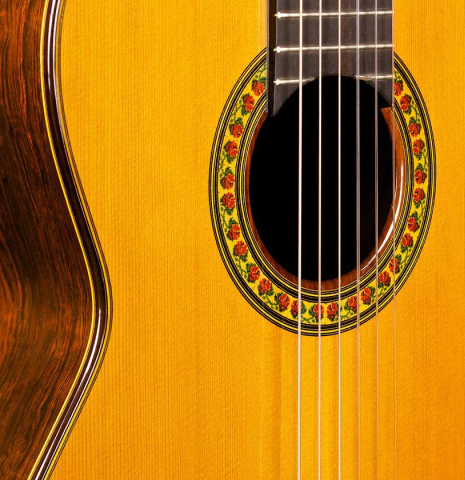 The soundboard and rosette of a 2004 Jose Ramirez "1a" classical guitar made of cedar and CSA rosewood
