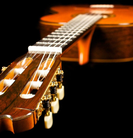 The headstock and tuning machines of a 2004 Jose Ramirez "1a" classical guitar made of cedar and CSA rosewood