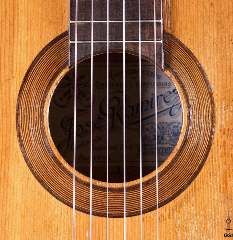 The rosette of a 1945 Jose Ramirez II classical guitar made of spruce and cypress