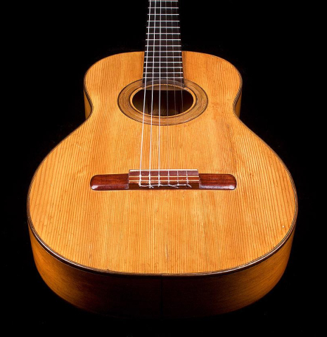 The front of a 1945 Jose Ramirez II classical guitar made of spruce and cypress