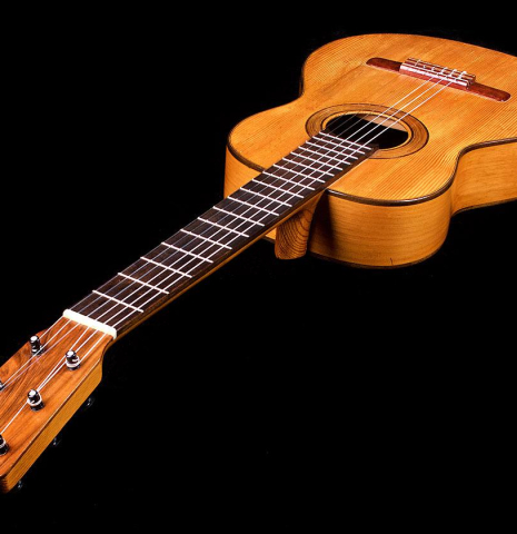 The front of a 1945 Jose Ramirez II classical guitar made of spruce and cypress
