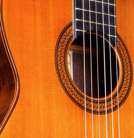 The top and rosette of a 1968 Jose Ramirez "1a MT" classical guitar made of cedar and Indian rosewood