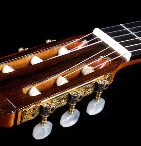 The headstock and tuning machines of a 1968 Jose Ramirez "1a MT" classical guitar made of cedar and Indian rosewood
